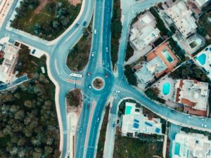 Aerial view of an urban intersection representing an AI use case reaching a governance decision point.